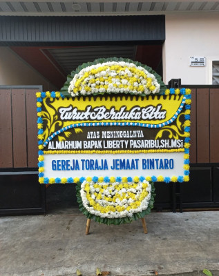 Papan Bunga Duka di Lamangga